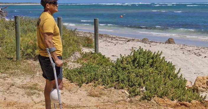 Australian shark attack survivor says predator was 'winking back' at him as he fought it off