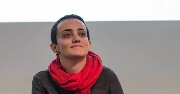 Egyptian editor faces trial after hours of questioning