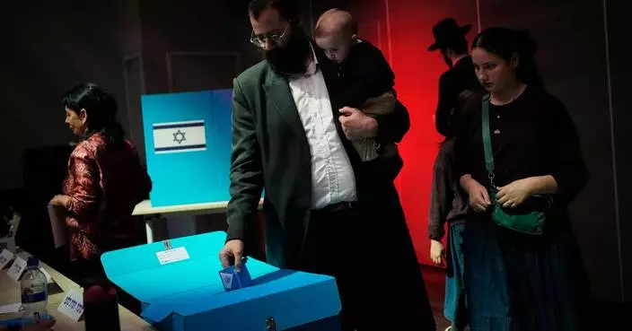 Israelis head to the polls with Netanyahu’s future at stake, in photos