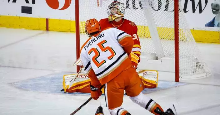 Ducks beat the winless Flames 4-2 in Calgary to start a home-and-home series