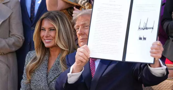 Trump signs an order aimed at boosting women's health research, a plan backed by the first lady