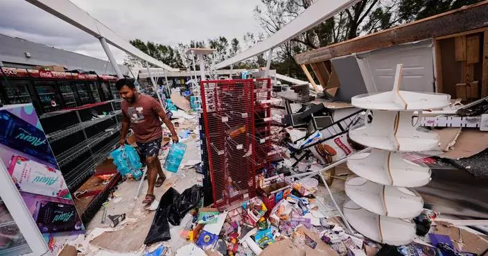 Isaias leaves trail of damage as it moves inland, in photos