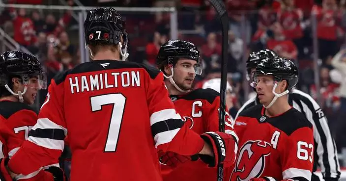 Nico Hischier has 2 goals and an assist to help the Devils roll to a 4-1 win over the Canucks