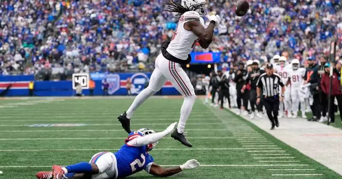 Cardinals end bizarre week by trading Harrison, getting thumped by Lions