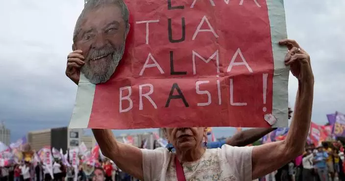 The Latest: Brazilians vote in presidential election dominated by Lula and Bolsonaro