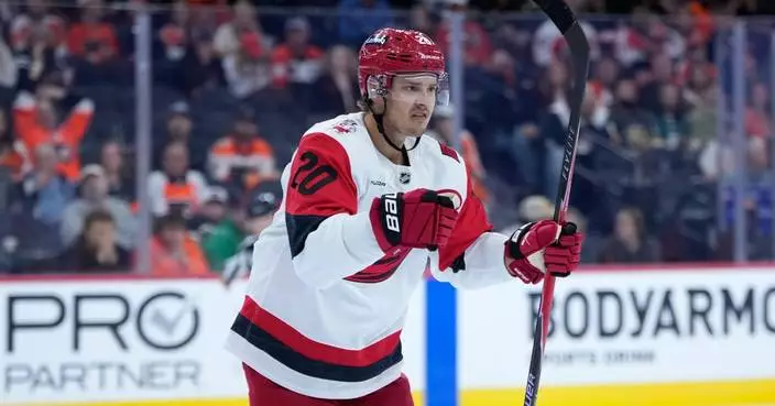 Hurricanes beat the Flyers 3-2 in OT for their first win as Aho scores 2