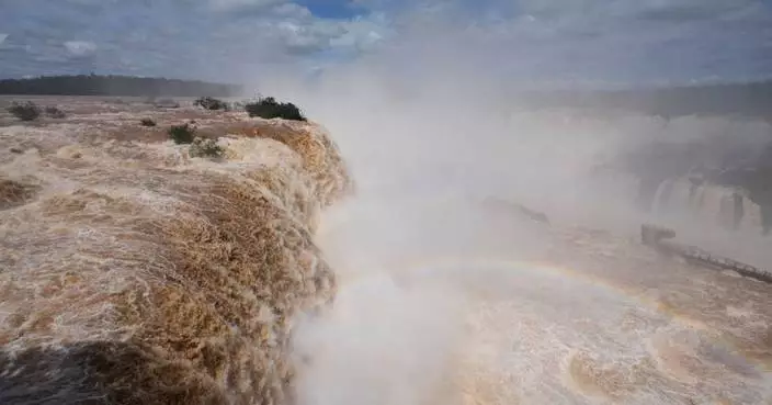 El Niño rains flood South America, sending residents fleeing and cattle swimming