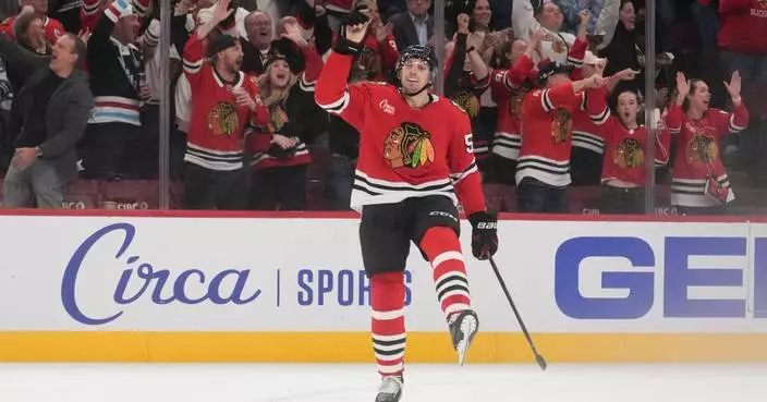 Rinzel and Frondell score, Blackhawks beat Blues 4-2 in Kane's return to Chicago