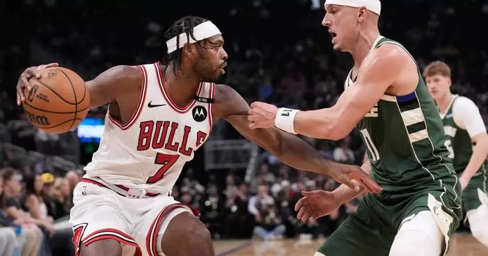 Powell scores 25 points to help the Bulls hold off the Bucks, 132-125