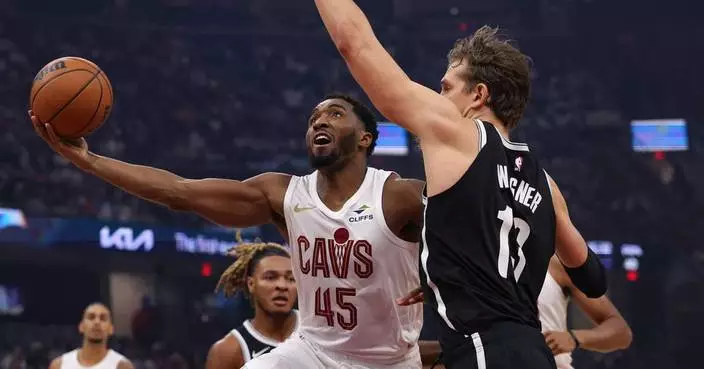 Cavaliers survive a late Nets rally to win home opener 125-121