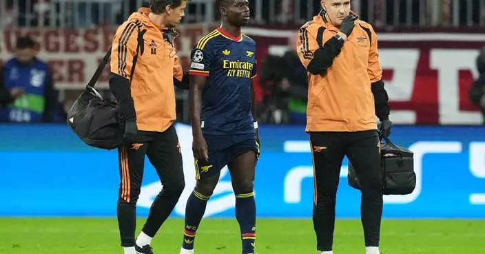 Arsenal forward Bukayo Saka forced off early with leg injury against Bayern Munich