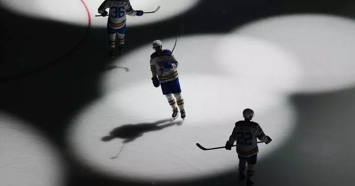 Blues forward Alexy Toropchenko leaves season opener with apparent shoulder injury