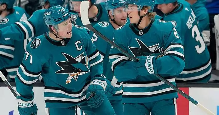 Luca Cagnoni scores in OT in the Sharks' season-opening victory over the Panthers