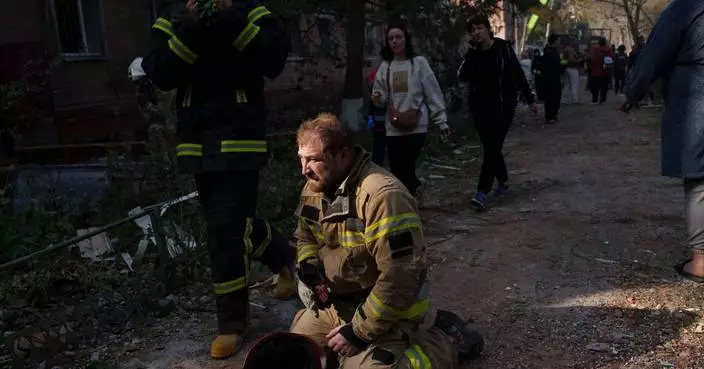 Rescuers pull bodies from rubble as Ukraine's death toll rises to 22 from a Russian missile strike