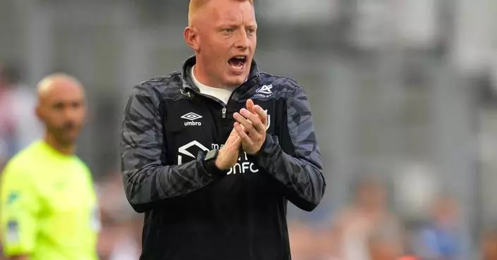 French soccer body says 'ghost goal' was good despite Auxerre coach's claim it was impossible