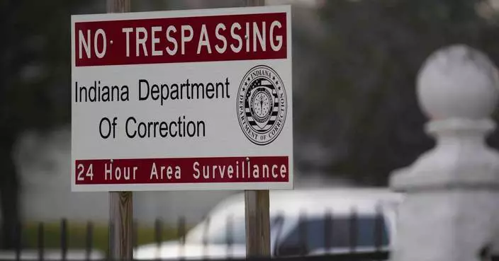 Indiana governor is urged to let death sentence proceed against man who killed 2 kids in fire