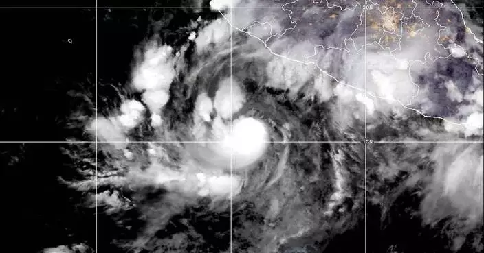 Pacific storm strengthens into a hurricane far off the coast of Mexico