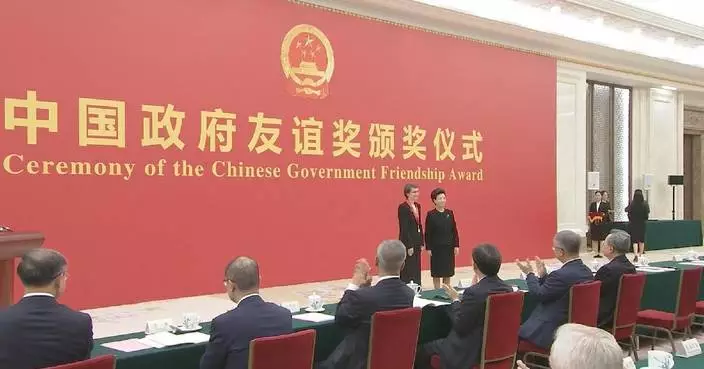 China honors 50 foreigners with friendship award