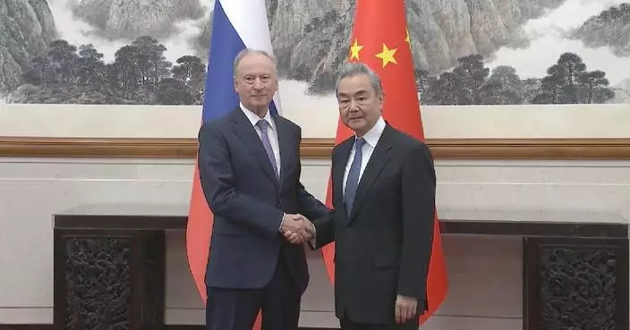 China's top diplomat meets Russian presidential aide