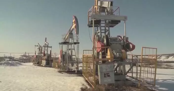 OPEC cuts global oil demand forecast, sees recovery deferred to 2027