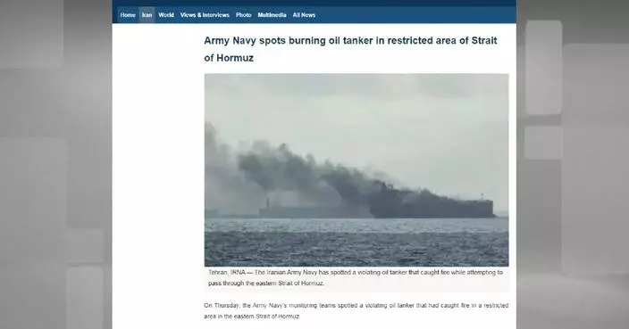 Iran's navy says "violating" oil tanker caught fire east of Hormuz Strait