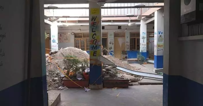 Grieving families, survivors question oversight after school roof collapse in northwest Pakistan