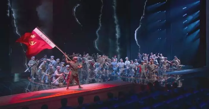 Dramatic stage performance recreates Red Army's daring river crossing during Long March