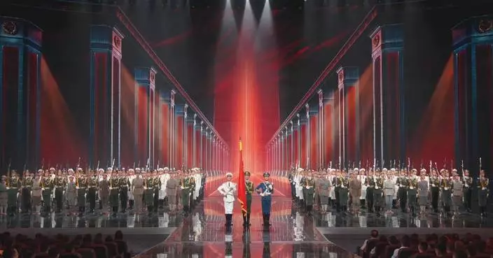 Military formations, montage of historical milestones showcase enduring spirit of Long March