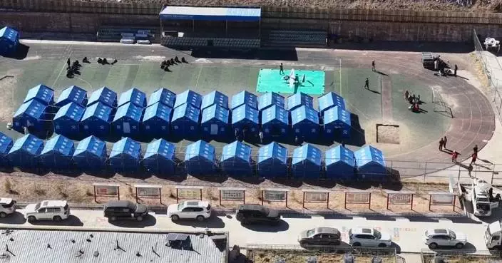 Quake-damaged school in Xizang sets up tents on playground to shelter teaching staff, their families