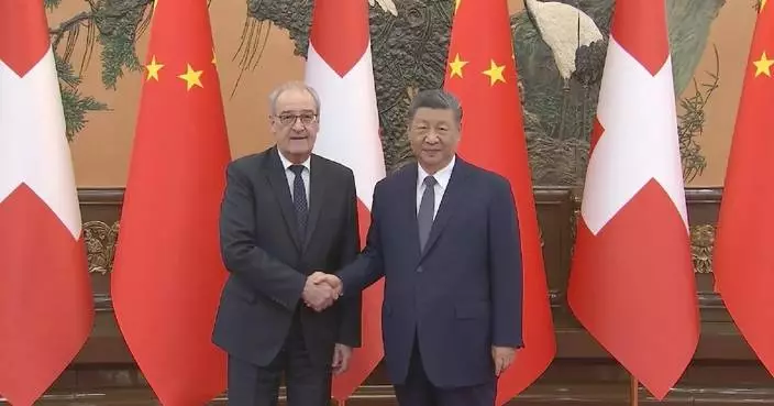 Xi meets president of Swiss Confederation, calling for more certainty for China-Europe economic, trade cooperation