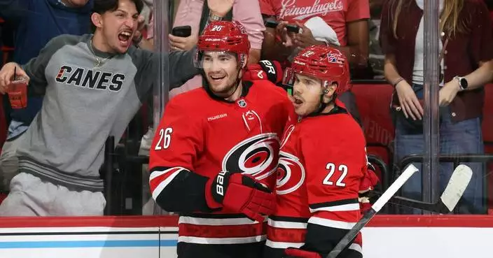 Logan Stankoven's first career hat trick helps Hurricanes beat Canucks 7-2