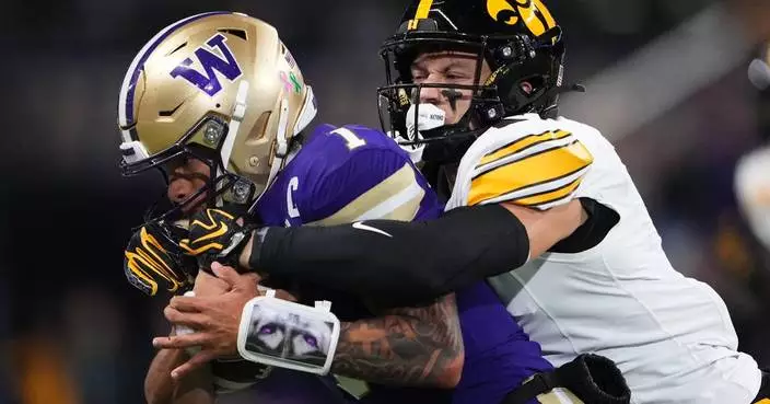 Kamari Moulton runs for career-best 208 yards and 2 TDs as No. 20 Iowa beats Washington, 41-24