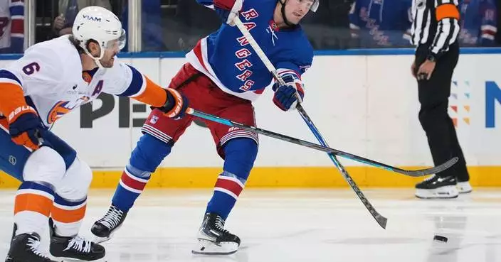 Alexis Lafrenière has a hat trick as the Rangers beat the Islanders for their 4th win in a row