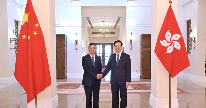 John Lee and Huang Runqiu Discuss Green Cooperation at Belt and Road Conference in Hong Kong.