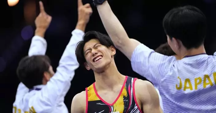 Japan rallies to capture gold in the men's team final at the world gymnastics championships