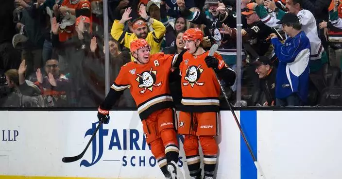 Anaheim Ducks get through a 15-hour travel day with NFL RedZone and some card games