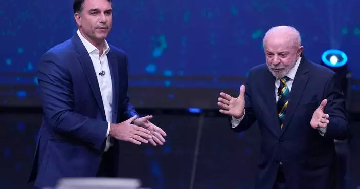 The Latest: Brazilians choose between Lula and Flávio Bolsonaro in presidential runoff