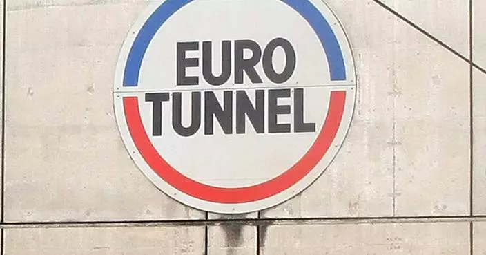 Minibus slams into Channel Tunnel shuttle train, injuring 19 and halting service