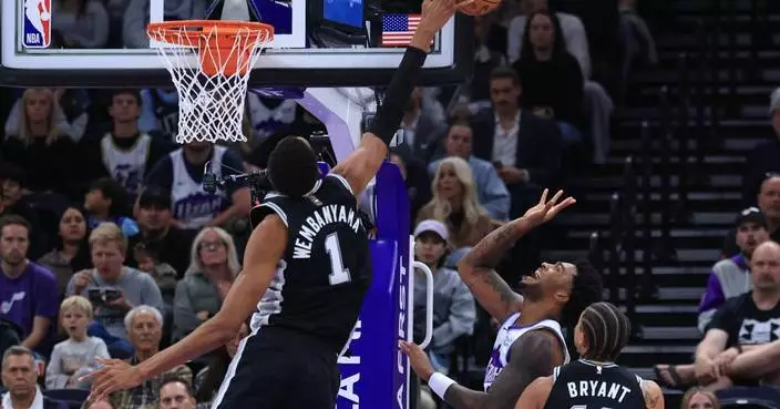 Wembanyama scores 36 points and the Spurs clamp down in overtime to beat the Jazz 117-111