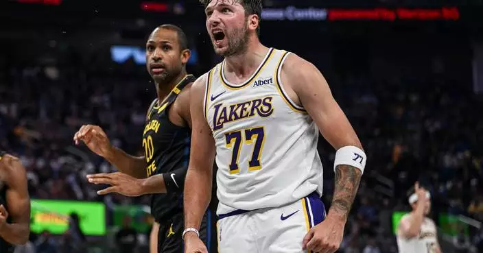 Stephen Curry scores 31 points and outduels Luka Doncic as Warriors come back to beat Lakers 112-95