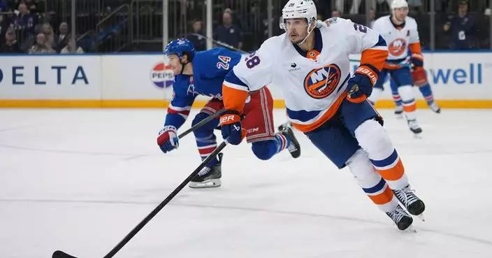 Islanders defenseman Alexander Romanov is out 6-8 months with a torn ACL in his right knee