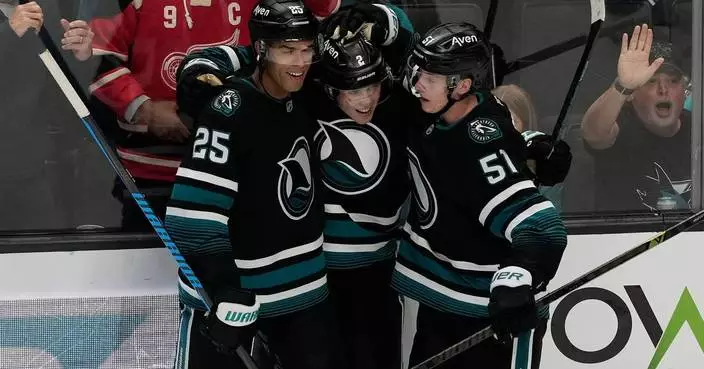Will Smith scores twice as the Sharks rally from a two-goal deficit to beat the Canucks 3-2