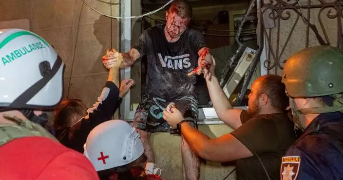 Photos of Ukrainian residents escaping their burning homes after deadly Russian attacks