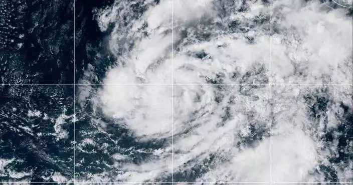 Vance becomes a hurricane as it churns off the coast of Mexico