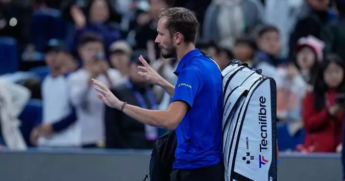 Medvedev advances at Shanghai in 1st match since  disqualification. Mustached Alcaraz wins opener