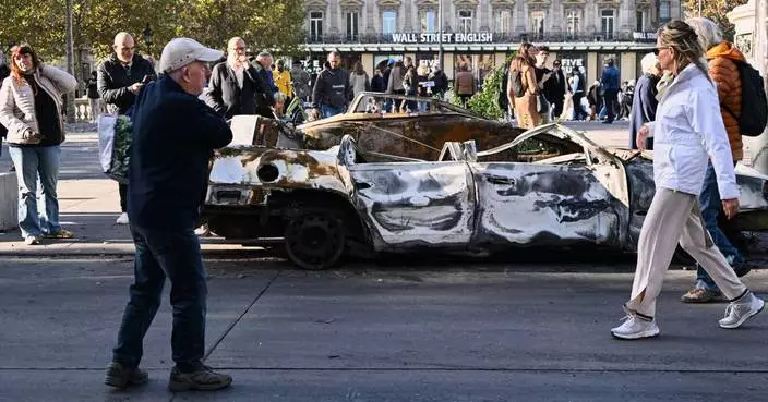 Paris police report 855 arrests after violent clashes and looting during protests