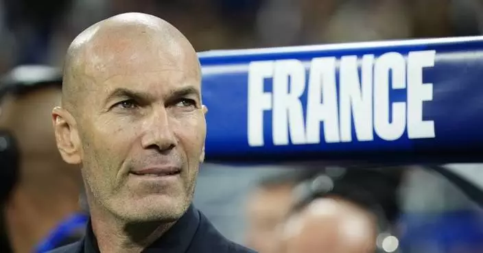 Fans show their appreciation for France coach Zidane as he takes charge of his first home game