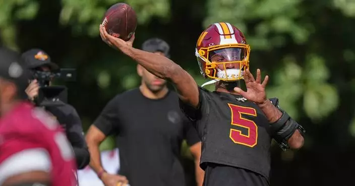 Jayden Daniels pledges to 'embrace the brace' on left arm as Commanders QB returns to practice