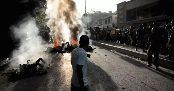 海地幫派掠劫民居反遭圍剿 群眾執行私刑當街焚屍