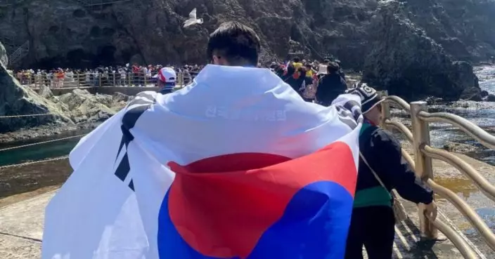 南韓議員披南韓國旗登獨島 日本提出抗議指不可接受